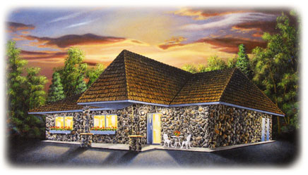 A stone cottage with a brown shingled roof, reminiscent of the Interlachen Inn, is lit warmly from within at sunset, surrounded by trees. There’s a small patio with a white table and chairs near the entrance.