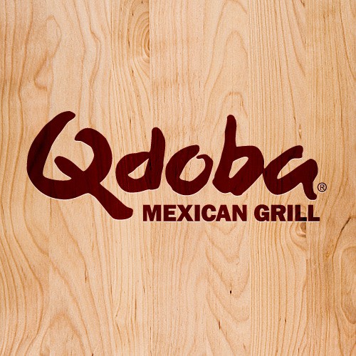 The Qdoba logo in bold dark red letters is displayed on a light woodgrain background, reflecting the fresh and vibrant spirit of Qdoba Mexican Grill.