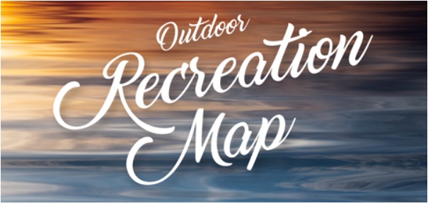 Text reading "Alexandria Area Lakes Recreation Map" in white, cursive script over a blurred background of warm and cool colors resembling a sunset over water.