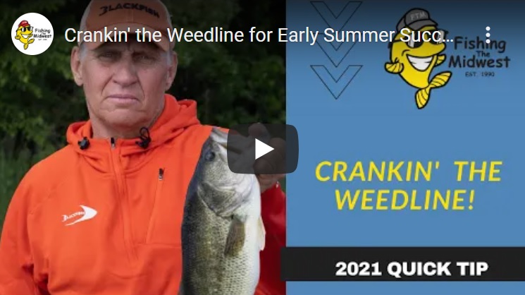 A man in an orange hoodie and cap holds a large fish, showing off his latest fishing catch. Next to him is a blue graphic with a yellow cartoon fish and text that reads, “Crankin’ the Weedline! 2021 Quick Tip.”.